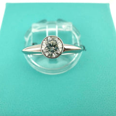 Tiffany & Co Platinum Bezet Diamond Engagement Ring Round 0.57ct F VS1 Bezel Set