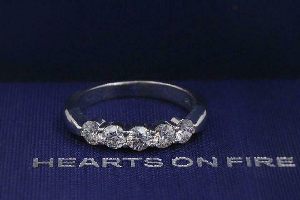 Hearts on Fire White 18 Karat Solitaire with 1 0.72 ct. Round Brilliant Cut  - Hearts on Fire Diamond SI1 / K 105-02030 - Jewelry Design Center