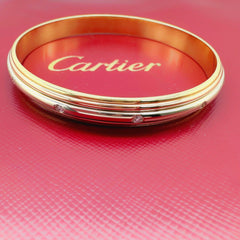 CARTIER  Saturne Multi-Tone 18kt Yellow White Rose Gold Diamond Bangle Bracelet