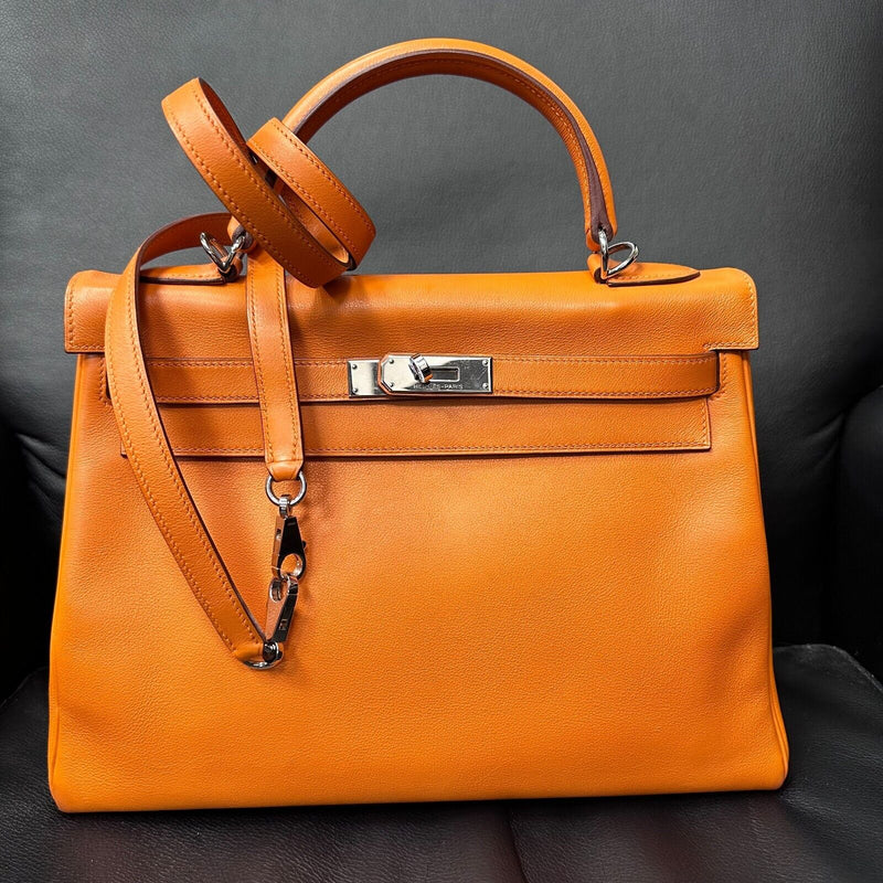 HERMES Kelly Retourne 32 cmm Circa 2005 Orange Veau Swift Palladium Hardware