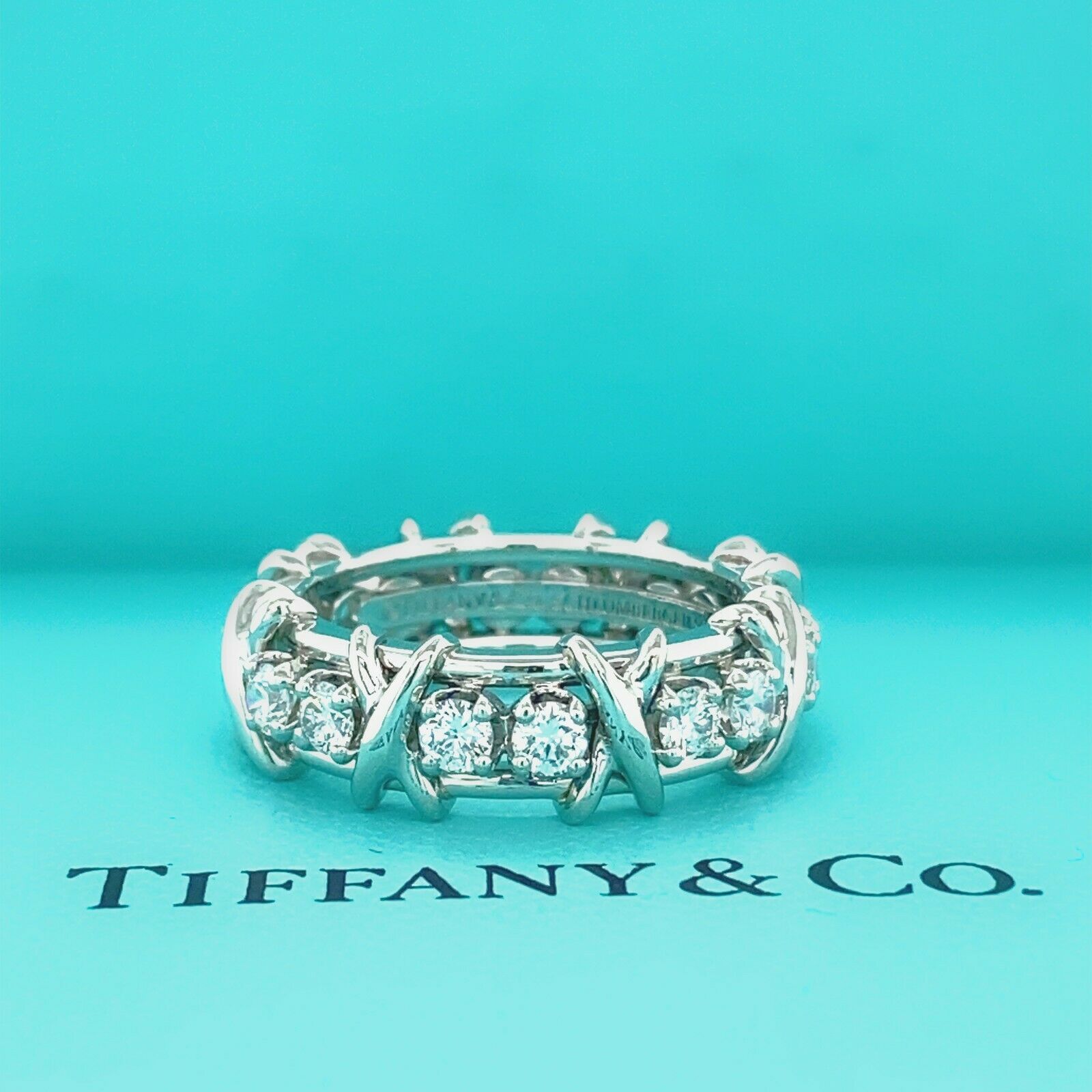 Tiffany & Co. Schlumberger® Sixteen Stone rings with diamonds, from left:  18k gold, 18k gold with sap… | Tiffany and co jewelry, Rare jewelry,  Tiffany wedding rings