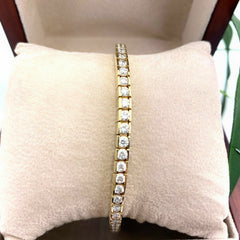 Round Brilliant Diamonds Channel Set 6.00 tcw 14K Yellow Gold Tennis Bracelet